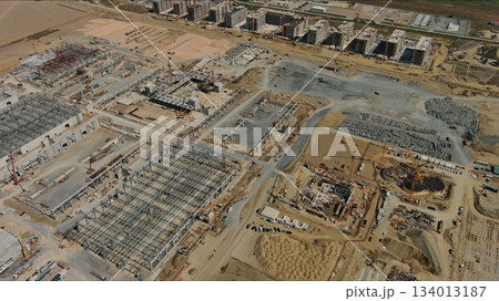 Industrial construction site with construction equipment and materials 134013187