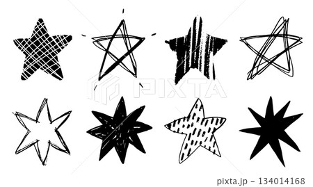 Set of black doodle style stars drawn by hand. Grunge scrawls, charcoal scribbles, rough brush strokes, underlines. Bold charcoal freehand stars. Crayon or marker scribbles 134014168