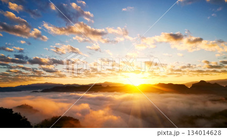 Scenic view dramatic beautiful sunset sky. Natural Sunset Sunrise on meadow silhouette shadow dark land. Vibrant dramatic sky on sunset, dawn, sunrise in Countryside. Landscape Colorful Sky At Sunset 134014628
