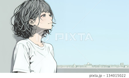 白い壁に向かって考え事をする若い女性