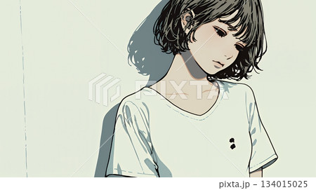 白い壁に向かって考え事をする若い女性