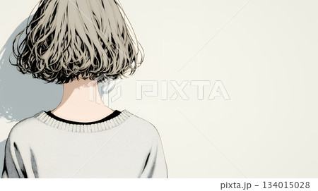 白い壁に向かって考え事をする若い女性