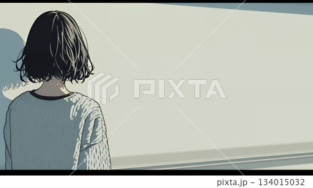 白い壁に向かって考え事をする若い女性