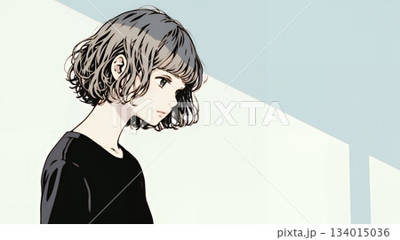 白い壁に向かって考え事をする若い女性