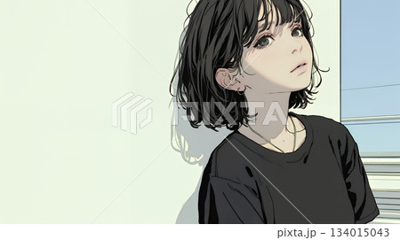 白い壁に向かって考え事をする若い女性