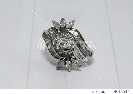 A stunning large white gold ring with natural round, marquise, and trapezoid diamonds. A stunning large white gold ring with natural round, marquise, and trapezoid diamonds. 134015544