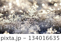 Snowflake sparkling close-up with shining stars abstract winter glitter background 134016635