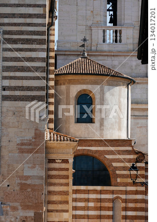 Architectural detail of the Verona Cathedral, showcasing its unique brickwork and design. 134017201