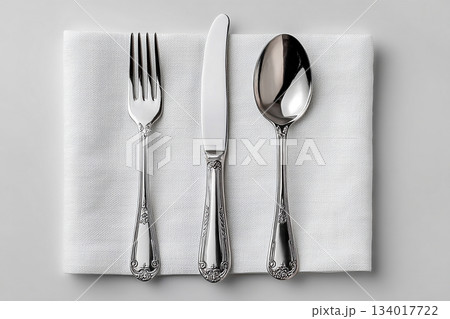 Kitchenware and dining products. Set for everyday dining, Fork, knife and spoon on a white background. Dining settings. 134017722
