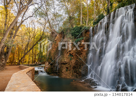 Scenic waterfall cascading into a tranquil pool at Monasterio de Piedra, Spain 134017814