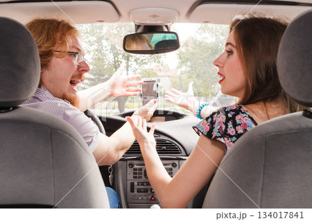 Couple arguing in car Couple arguing in car 134017841