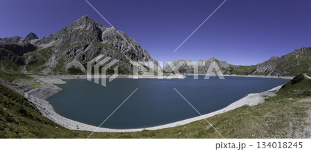 Lunersee artificial lake in Ratikon Alps, Vorarlberg, Austria during bright day 134018245
