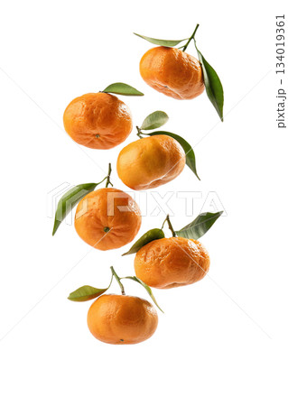 Minimalist stack of ripe tangerines showcasing balance and vibrant color, perfect for nutrition, freshness, and simple still life themes Minimalist stack of ripe tangerines showcasing balance and vibrant color, perfect for nutrition, freshness, and simple still life themes 134019361