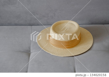 braided hat with brim on sofa braided hat with brim on sofa 134020158