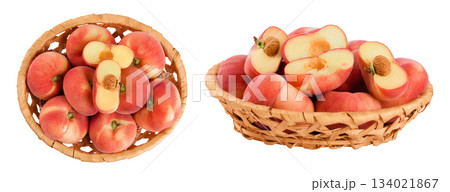 chinese flat donut peaches in a wicker basket isolated on white background. Top view. Flat lay chinese flat donut peaches in a wicker basket isolated on white background. Top view. Flat lay 134021867