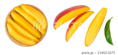 mango diced in wooden bowl isolated on white background. Top view. Flat lay mango diced in wooden bowl isolated on white background. Top view. Flat lay 134021875