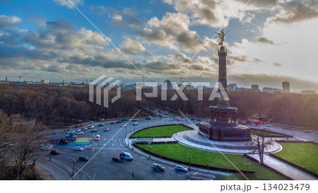 Drone point oF view on Victory column (67m, built 1864) with observation desk on top of it : sunbeams of sunset Drone point oF view on Victory column (67m, built 1864) with observation desk on top of it : sunbeams of sunset 134023479