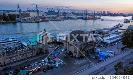 Drone panorama of the Norderelbe: St. Pauli Landungsbrucken at blue hour with the clock tower 134024041