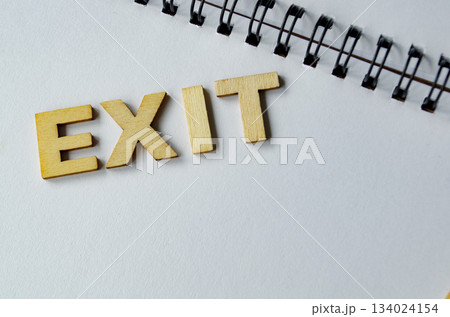 EXIT text on white notepad. EXIT text on white notepad. 134024154