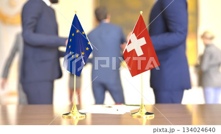 EU - Switzerland bilateral meeting with desk flags, 3D rendering 134024640