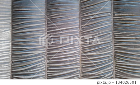 Elegant White Draped Fabric Texture with Soft Vertical Pleats Elegant White Draped Fabric Texture with Soft Vertical Pleats 134026301