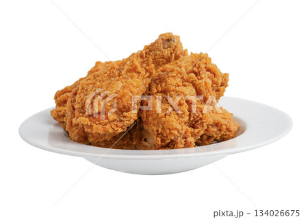 Fried chicken drumstick pieces on white plate isolated on whte background with clipping path. 134026675