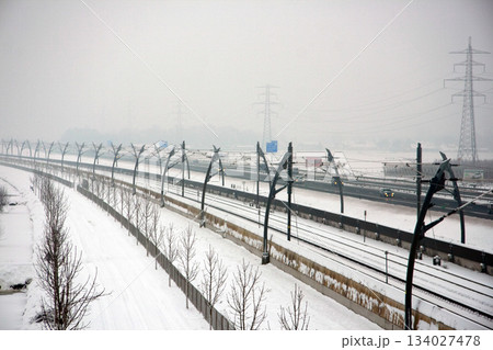 Traffic on the railroads in Tiel has to deal with bad weather. Traffic on the railroads in Tiel has to deal with bad weather. 134027478