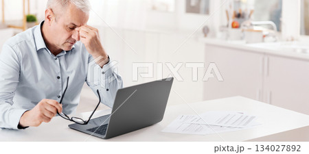 Thinking About Problems. Fatigued senior businessman massaging nosebridge with closed eyes, free space Thinking About Problems. Fatigued senior businessman massaging nosebridge with closed eyes, free space 134027892