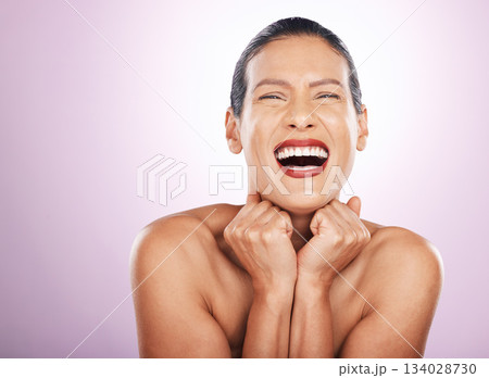 Laughing, face makeup and lipstick of woman in studio isolated on a purple background. Skincare, cosmetics portrait and happy, funny and mature female model with red lip gloss for skin glow or beauty 134028730
