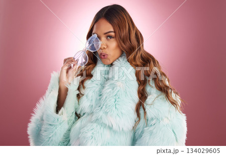 Portrait, pose and woman in studio with glasses for fashion, cool and gen z aesthetic on red background. Face, fashionable and trendy girl model posing with style, trendy and confident while isolated Portrait, pose and woman in studio with glasses for fashion, cool and gen z aesthetic on red background. Face, fashionable and trendy girl model posing with style, trendy and confident while isolated 134029605