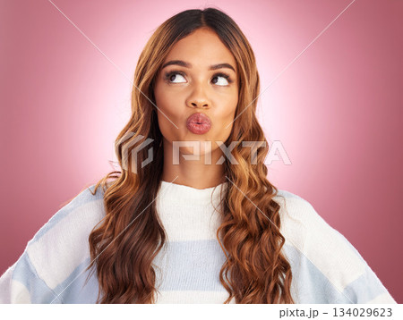 Kiss mouth, face and studio with a woman with kissing, love and emoji expression feeling silly. Playful, fun and isolated pink background with copy space of a female model with a funny humor and joke Kiss mouth, face and studio with a woman with kissing, love and emoji expression feeling silly. Playful, fun and isolated pink background with copy space of a female model with a funny humor and joke 134029623