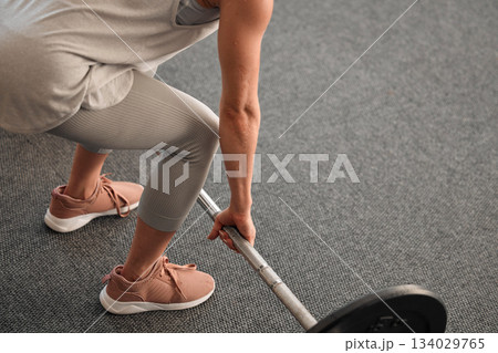 Exercise, weightlifting and woman in gym, barbell for bodybuilding and muscle training, strong with power and endurance. Fitness, health and female bodybuilder, workout equipment and active lifestyle Exercise, weightlifting and woman in gym, barbell for bodybuilding and muscle training, strong with power and endurance. Fitness, health and female bodybuilder, workout equipment and active lifestyle 134029765