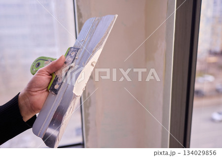 The Wall Repair Process Involves Properly Using Spackling Paste for a Quality Finish The Wall Repair Process Involves Properly Using Spackling Paste for a Quality Finish 134029856