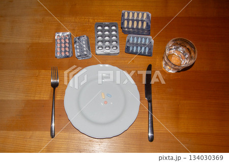 Taking medicines for breakfast Taking medicines for breakfast 134030369
