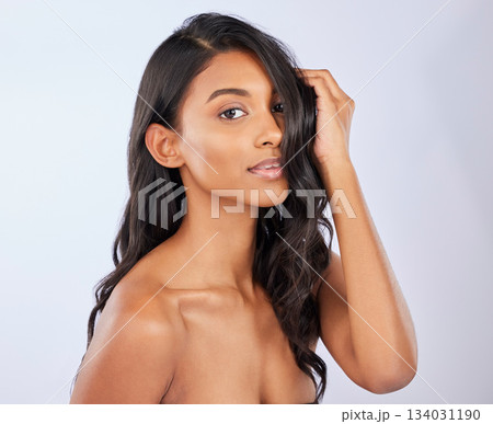 Woman, portrait and long curly hair in salon treatment, keratin or self care against a white studio background. Face of beautiful female model with healthy hairstyle, haircare or beauty cosmetics Woman, portrait and long curly hair in salon treatment, keratin or self care against a white studio background. Face of beautiful female model with healthy hairstyle, haircare or beauty cosmetics 134031190