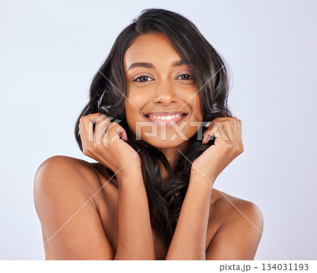 Woman, portrait smile and curly hair for salon treatment, keratin or self care against white studio background. Happy isolated female model smiling for healthy hairstyle, haircare or beauty cosmetics Woman, portrait smile and curly hair for salon treatment, keratin or self care against white studio background. Happy isolated female model smiling for healthy hairstyle, haircare or beauty cosmetics 134031193