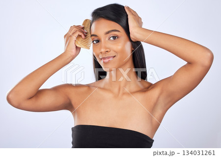 Woman comb hair, beauty and haircare cosmetics, keratin treatment and smile in portrait on studio background. Indian female grooming, straight hairstyle and skin glow, Brazilian and cosmetic care 134031261