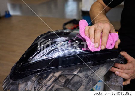 Applying a Protective Film on the Surface of Your Car for Enhanced Durability and Shine Applying a Protective Film on the Surface of Your Car for Enhanced Durability and Shine 134031386