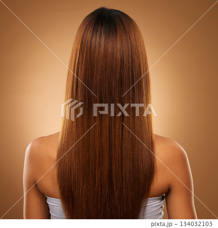 Back of hair, beauty and woman in studio for shampoo, wellness and keratin treatment on brown background. Hairdresser mockup, salon and girl with hairstyle for growth, haircare texture and cosmetics Back of hair, beauty and woman in studio for shampoo, wellness and keratin treatment on brown background. Hairdresser mockup, salon and girl with hairstyle for growth, haircare texture and cosmetics 134032103