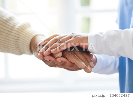 Holding hands, senior patient and nurse for support, healthcare or empathy at nursing home. Elderly person and caregiver together for trust, homecare and counseling or help for health in retirement 134032487