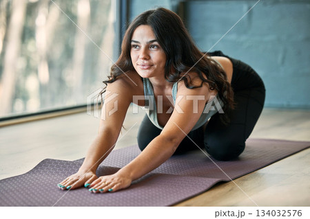 Yoga, child pose and woman stretching in gym for health, wellness or flexibility exercise. Pilates idea, thinking and young female yogi stretch, holistic training and workout for healthy fitness. Yoga, child pose and woman stretching in gym for health, wellness or flexibility exercise. Pilates idea, thinking and young female yogi stretch, holistic training and workout for healthy fitness. 134032576