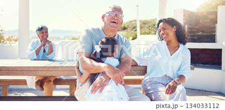 Family, outdoor and laughing on vacation with child, mother and grandpa on a bench with love and care. Girl, woman and man or grandparents happy in summer for hug, fun and happiness on holiday patio 134033112