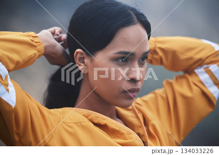 Woman, exercise and start of a runner ready with fitness idea, thinking and workout. Outdoor, young female and face of a person in the morning for a athlete run, training and marathon running 134033226