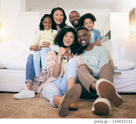 Black family, smile and portrait on couch with kids, parents and grandparents with happiness, love and care. Senior man, women and children with generations, hug and bonding in living room on floor 134033232
