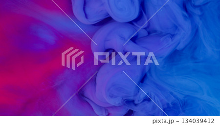 Cloud blend. Ink fluid. Defocused blue pink purple color fume wave swirling texture floating on abstract creative vivid background. 134039412