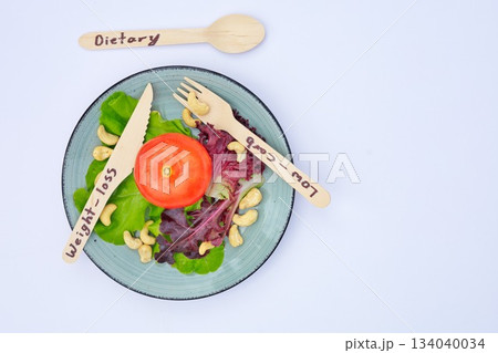 Dietary Words On Wooden Cutlery And Plate of Diet Food Copyspace 134040034
