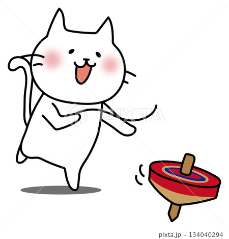 コマ回しをして遊ぶ白い猫 134040294