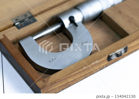 Mechanical micrometer stored in a wooden protective case Mechanical micrometer stored in a wooden protective case 134042130