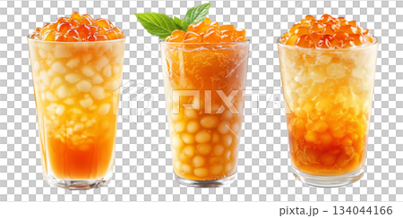 Orange bubble tea Filipino Sagot Gulaman filled with tapioca pearls and topped with mint, isolated on white background. 134044166