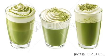 Creamy matcha latte topped with whipped cream and green tea powder in glass, isolated on a white transparent background 134044169